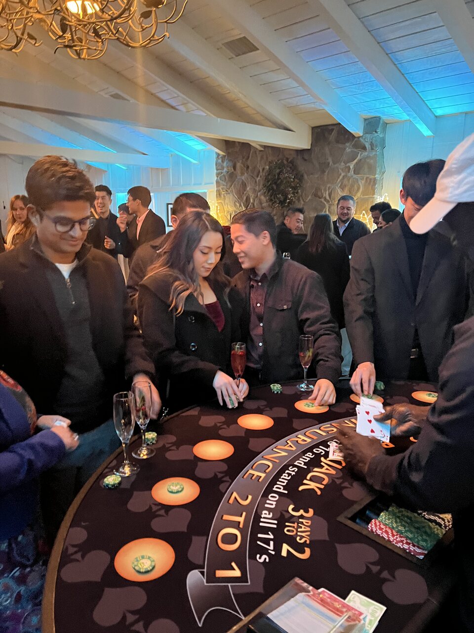 Guests playing blackjack with a pro dealer at a Sacramento casino night
