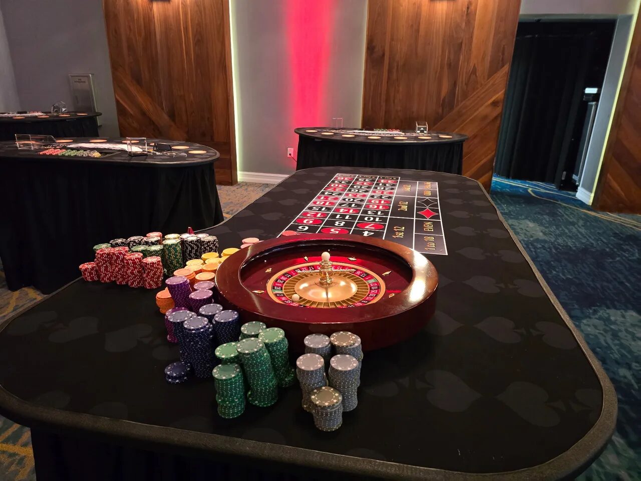 Roulette wheel glowing at a Sacramento holiday casino party
