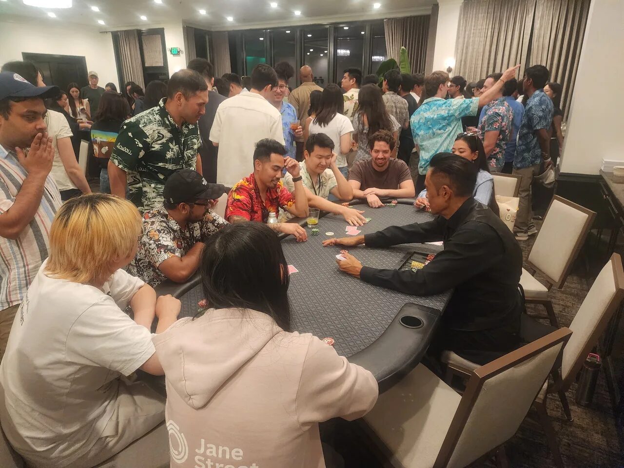 Players at a Texas Hold'em poker table during a Sacramento casino night